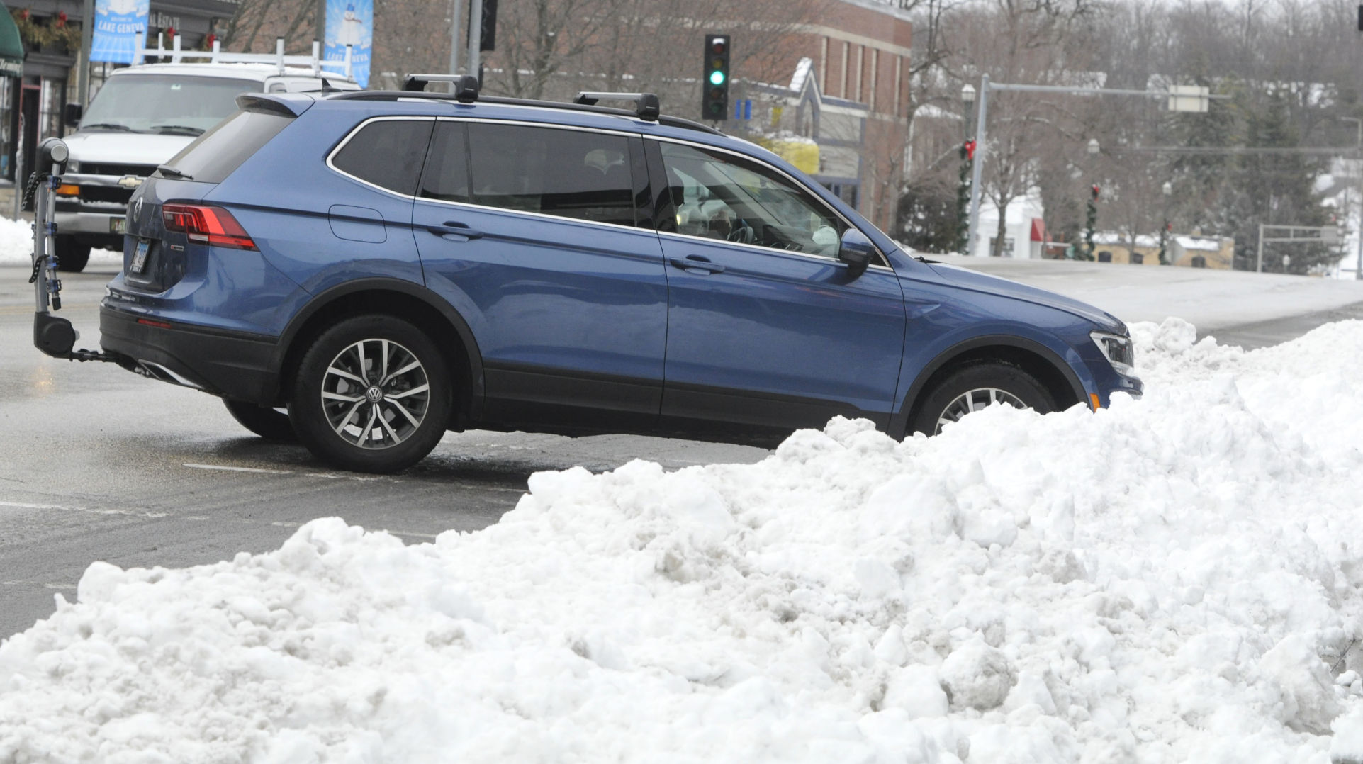 Several downtown business owners said they were disappointed that snow had been pushed into city parking lots.